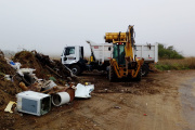 Limpieza de un basural a cielo abierto en el Camino de la Piedra